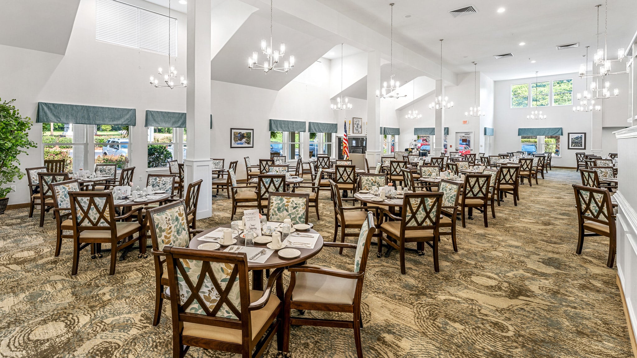 The dining room at The Lodge at Wake Forest set for mealtime