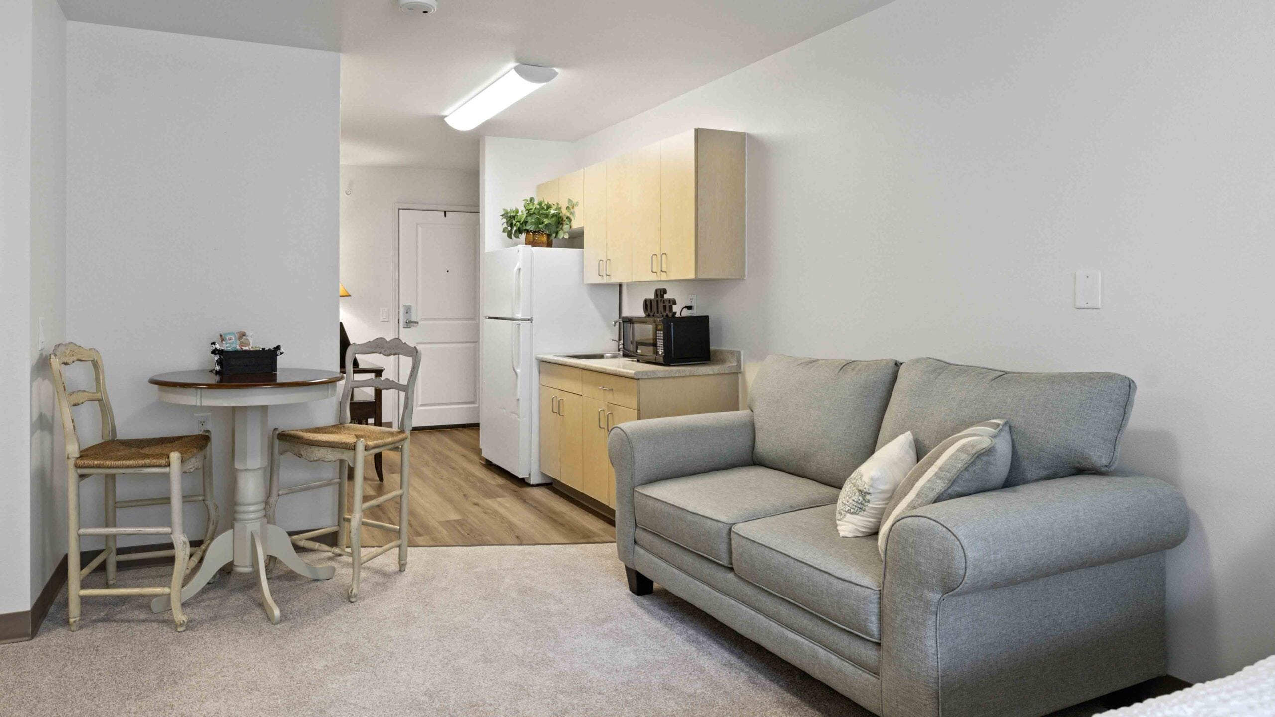 A living room in a The Lodge at Wake Forest apartment